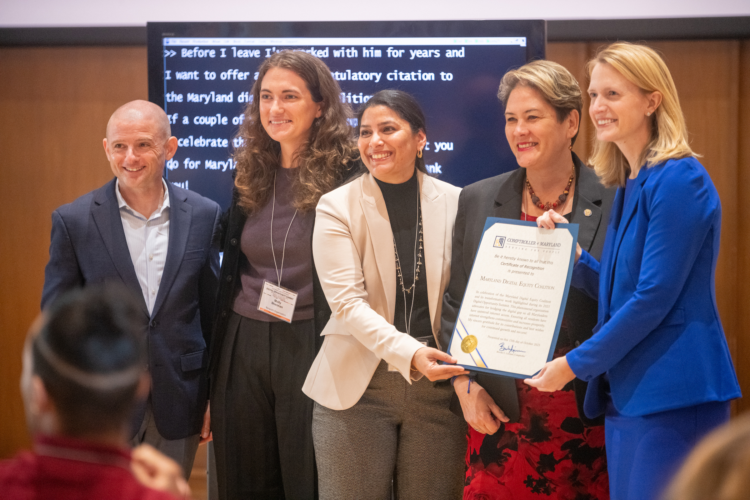 Josh Bokee, Molly Sherman, Vishnupriya Desai, Mistuko Herrera, and Brooke Lierman stand with a Digital Opportunity Citation.